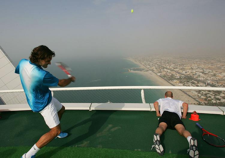 The Caption, says it all.-roger-20federer-20and-20andre-20agassi-20playing-20tennis-20on-20helicopter-20platform-20of-20th.jpg