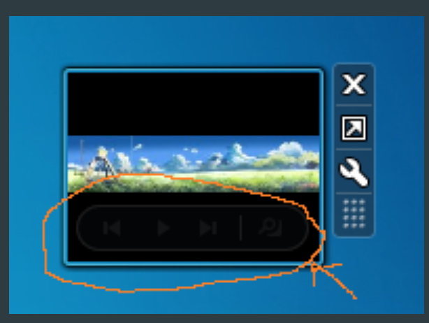 Barely visible buttons on the slide show gadget-larger.png