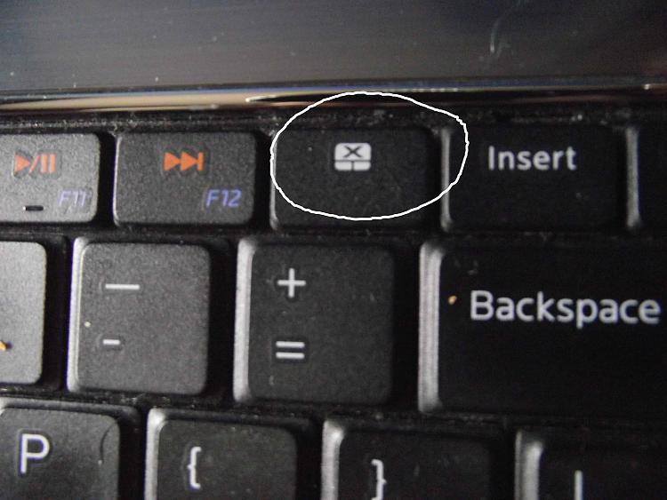How do I disable the touchpad on my laptop?-dell-disable-touchpad-key.jpg