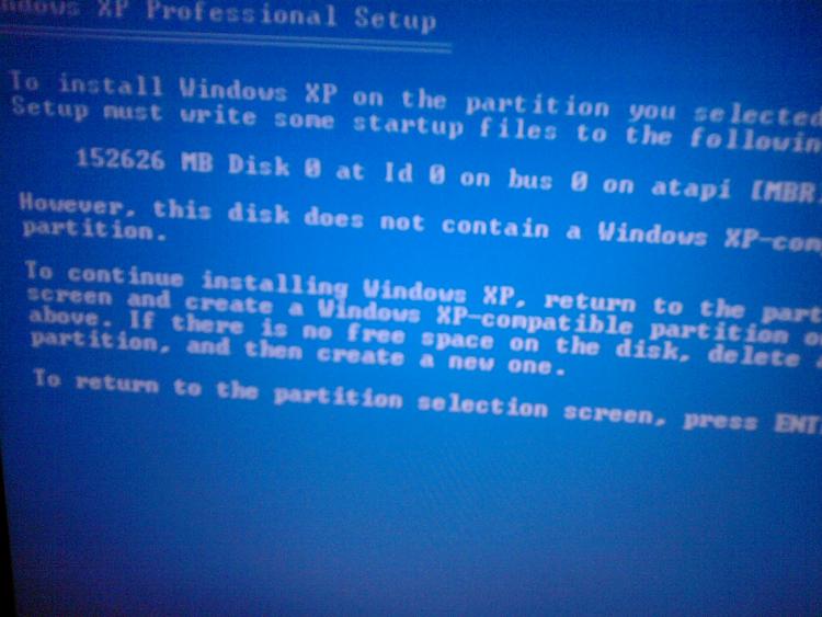 How fix &quot;This disk doesn't contain a Windows-XP compatible partition&quot;?-photo0091.jpg