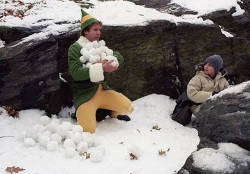 Buddy-and-Michael-in-a-snowball-fight.jpg